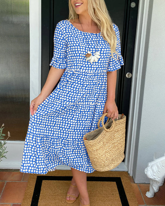 Vestido Midi de Lunares Chic